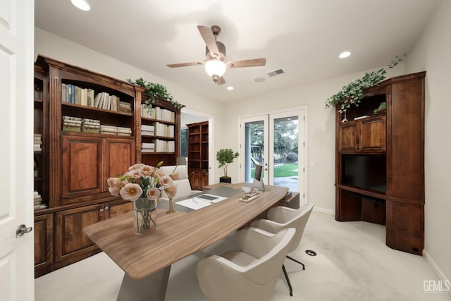 home office with recessed lighting, visible vents, a ceiling fan, light carpet, and baseboards