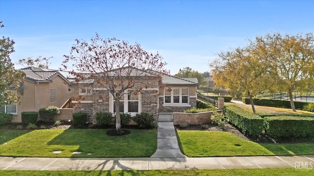 view of front of house with a front lawn