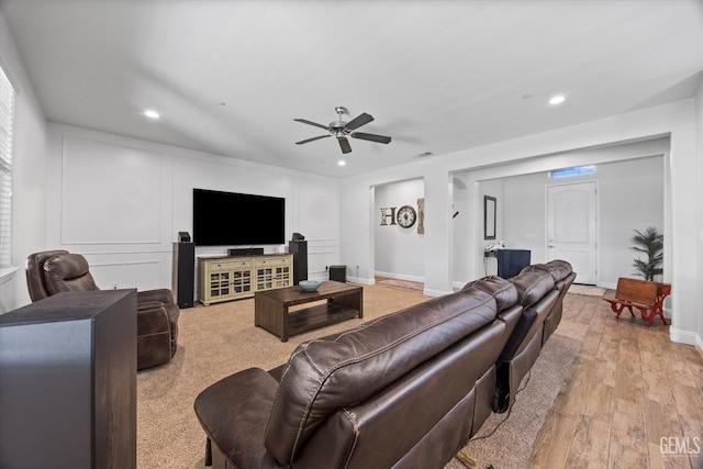 living room featuring light wood-type flooring, baseboards, recessed lighting, and ceiling fan