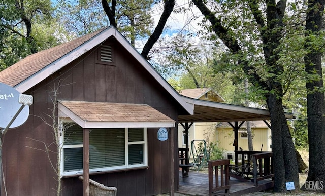 exterior space featuring a wooden deck