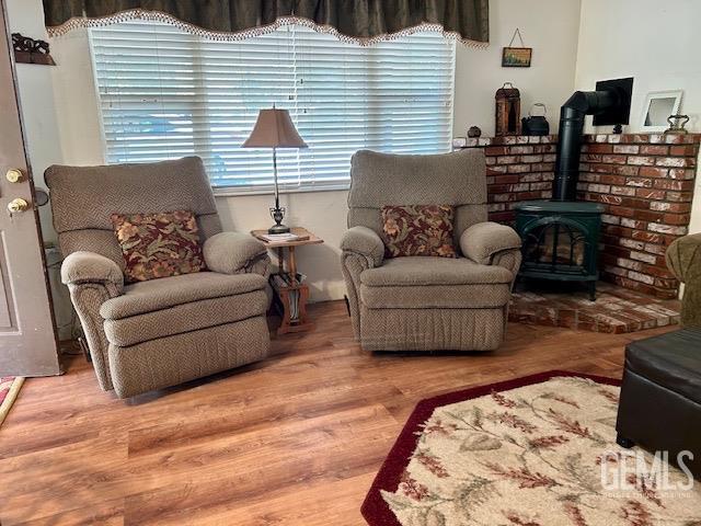 sitting room featuring hardwood / wood-style floors