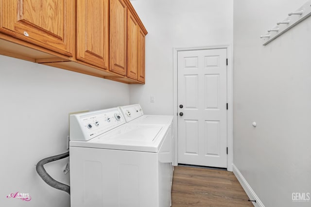 10102 Lace Cascade Ct, Bakersfield, CA 93311 - laundry area with cabinet space, dark wood-style floors, and washing machine and clothes dryer