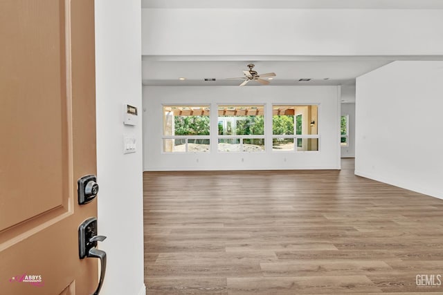 10102 Lace Cascade Ct, Bakersfield, CA 93311 - unfurnished living room featuring wood finished floors and ceiling fan