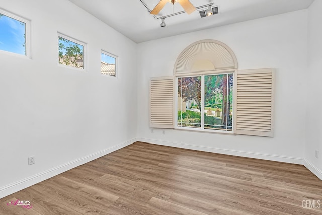 10102 Lace Cascade Ct, Bakersfield, CA 93311 - spare room featuring wood finished floors and baseboards