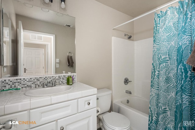 9404 Red Rock Creek Way, Bakersfield, CA 93311 - full bathroom with shower / bathtub combination with curtain, vanity, and toilet