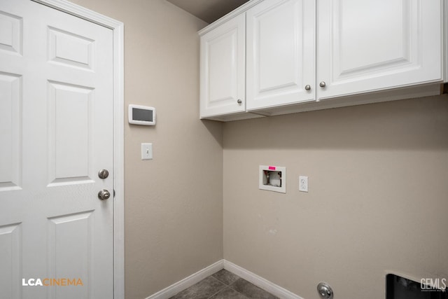 9404 Red Rock Creek Way, Bakersfield, CA 93311 - washroom with cabinet space, baseboards, hookup for a washing machine, and dark tile patterned floors