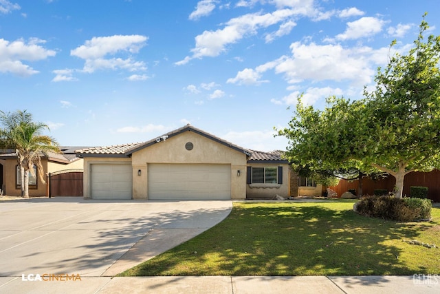 9404 Red Rock Creek Way, Bakersfield, CA 93311 - view of front of property featuring a garage, stucco siding, driveway, and a tiled roof