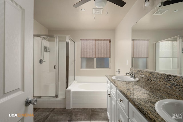 9404 Red Rock Creek Way, Bakersfield, CA 93311 - full bathroom with a shower stall, a bath, double vanity, ceiling fan, and tile patterned floors