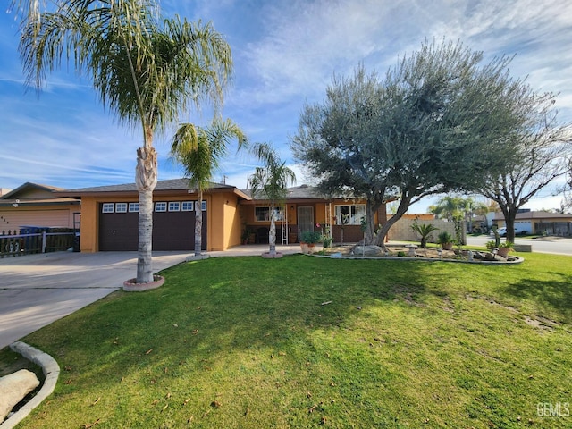 ranch-style home featuring a garage and a front lawn