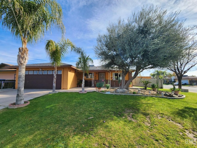 ranch-style house featuring a garage, a porch, and a front yard