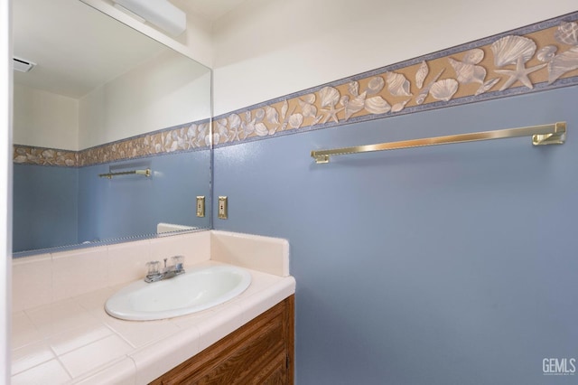 bathroom with visible vents and vanity