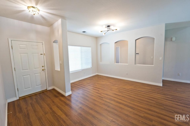 6720 Alderbrook Ln, Bakersfield, CA 93312 - entryway featuring dark wood-style floors and a chandelier