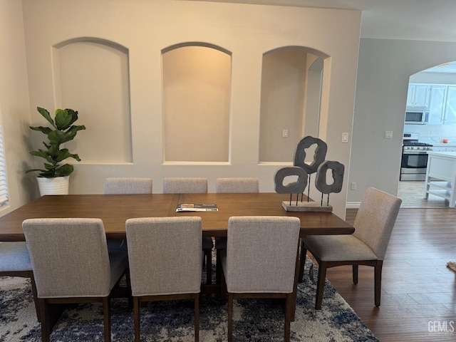 6720 Alderbrook Ln, Bakersfield, CA 93312 - dining room with wood finished floors and arched walkways