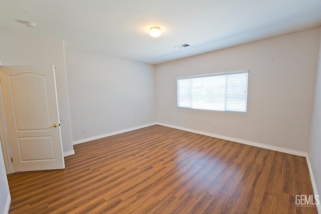 6720 Alderbrook Ln, Bakersfield, CA 93312 - unfurnished room with a smoke detector and wood finished floors