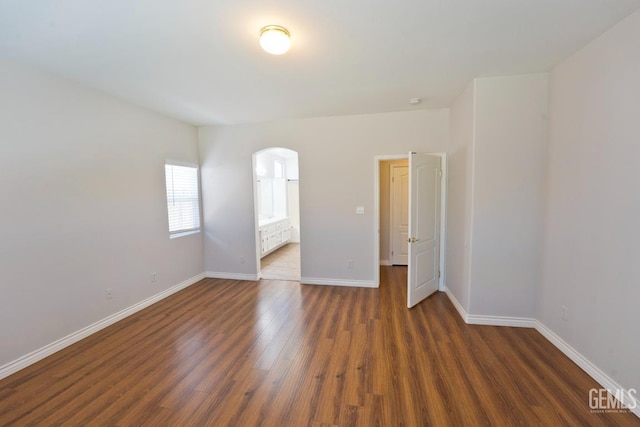 6720 Alderbrook Ln, Bakersfield, CA 93312 - spare room with wood finished floors and arched walkways