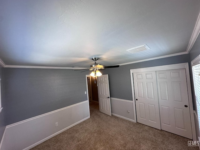 4049 Liz Dr, Bakersfield, CA 93312 - unfurnished bedroom featuring carpet flooring, a closet, crown molding, and a ceiling fan