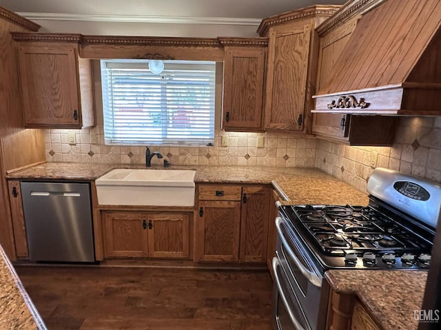 4049 Liz Dr, Bakersfield, CA 93312 - kitchen with appliances with stainless steel finishes, custom range hood, ornamental molding, decorative backsplash, and dark wood-style flooring