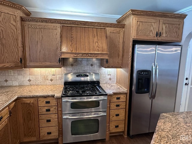 4049 Liz Dr, Bakersfield, CA 93312 - kitchen featuring stainless steel appliances, custom range hood, crown molding, dark wood-style floors, and tasteful backsplash