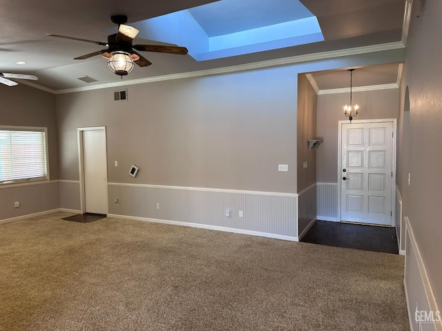 4049 Liz Dr, Bakersfield, CA 93312 - unfurnished room featuring a ceiling fan, dark colored carpet, crown molding, wainscoting, and a skylight