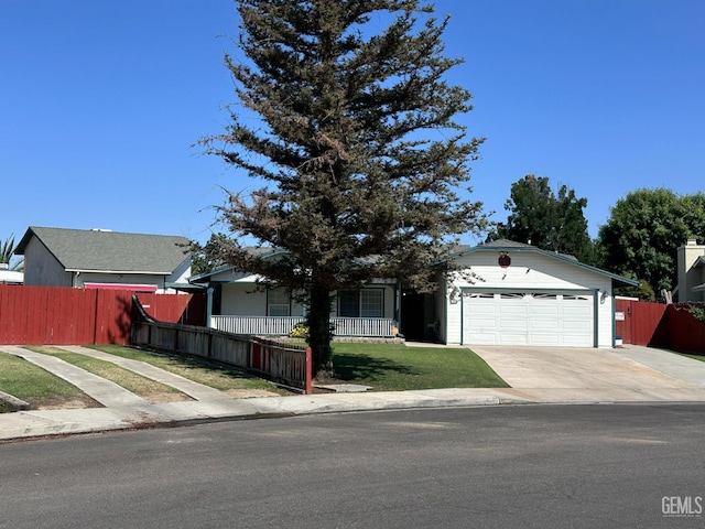 4049 Liz Dr, Bakersfield, CA 93312 - ranch-style home with concrete driveway and an attached garage