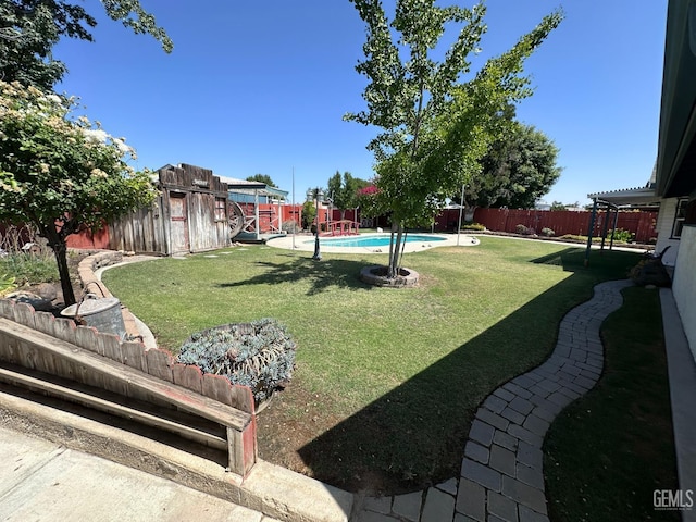 4049 Liz Dr, Bakersfield, CA 93312 - fenced backyard with a storage unit