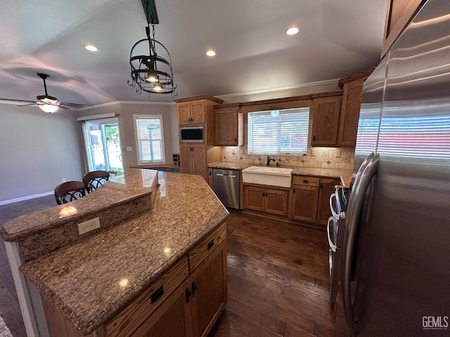 4049 Liz Dr, Bakersfield, CA 93312 - kitchen featuring stainless steel appliances, a kitchen island, recessed lighting, tasteful backsplash, and a ceiling fan