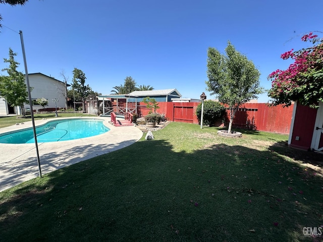 4049 Liz Dr, Bakersfield, CA 93312 - view of pool with a fenced backyard, a patio, and a storage unit