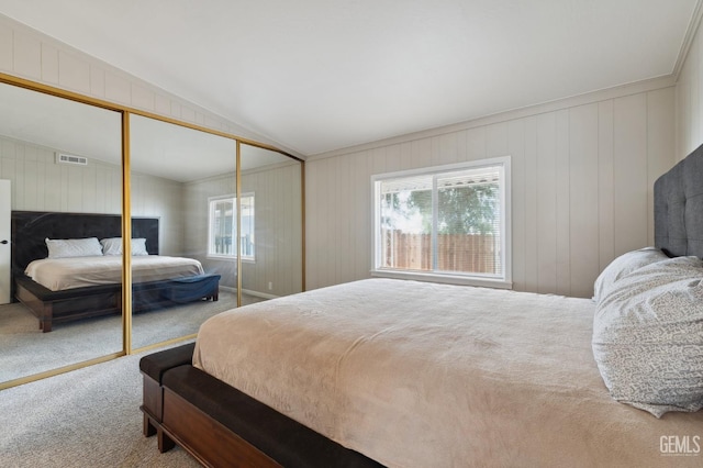 4401 Hughes Ln Unit 148, Bakersfield, CA 93304 - bedroom featuring carpet flooring, a closet, and vaulted ceiling