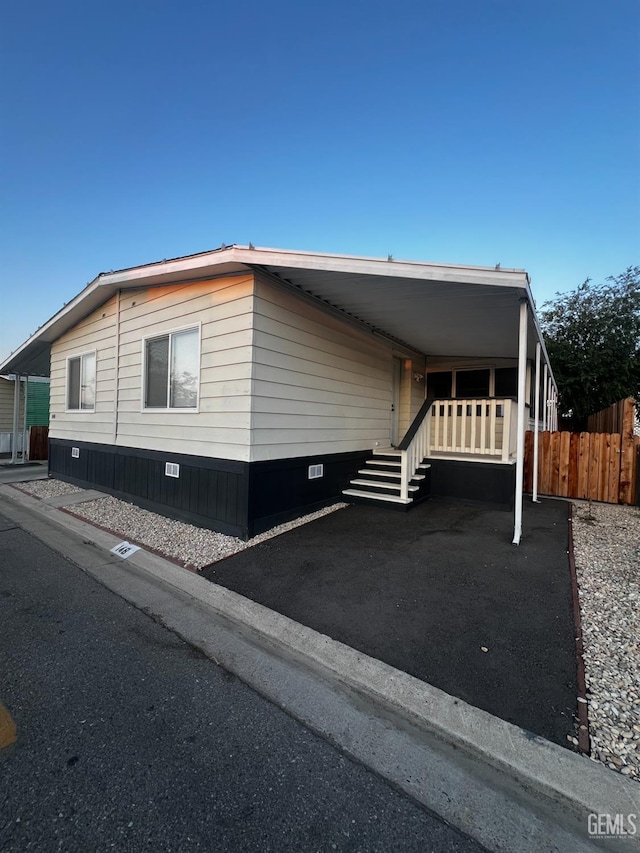 4401 Hughes Ln Unit 148, Bakersfield, CA 93304 - view of property exterior with crawl space