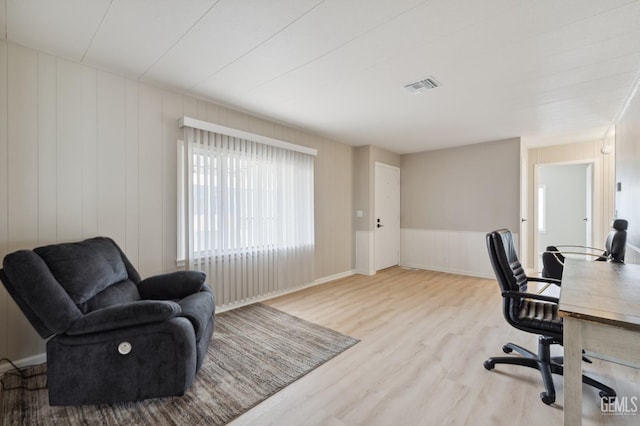 4401 Hughes Ln Unit 148, Bakersfield, CA 93304 - office with wood finished floors and a decorative wall