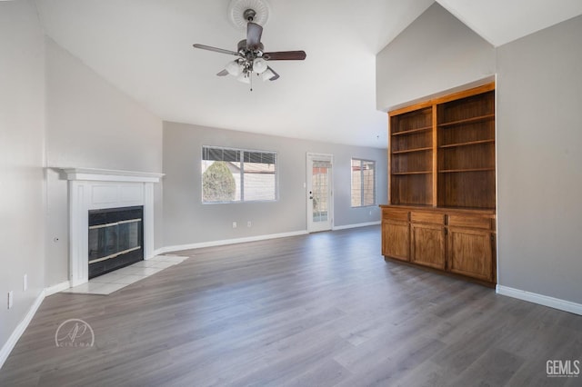 unfurnished living room with light hardwood / wood-style floors, lofted ceiling, and ceiling fan