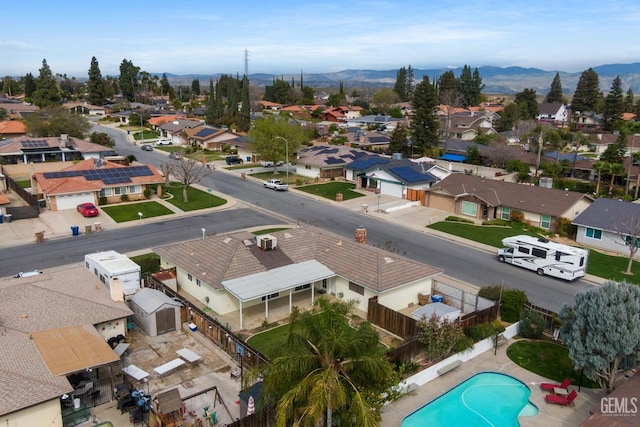 drone / aerial view with a mountain view and a residential view