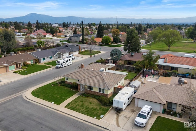 bird's eye view with a mountain view and a residential view