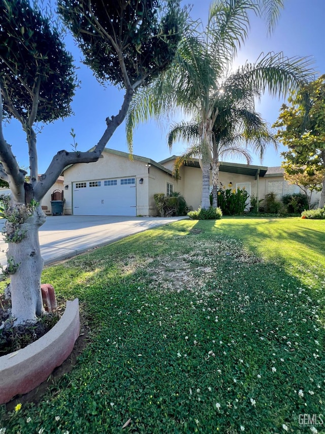 107 Coverdale Ct, Bakersfield, CA 93307 - ranch-style home with stucco siding, a garage, driveway, and a front lawn