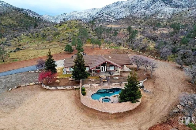 bird's eye view with a mountain view