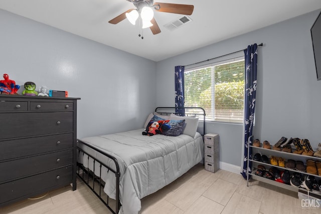 5502 White Wheat Ave, Bakersfield, CA 93313 - bedroom with ceiling fan and baseboards