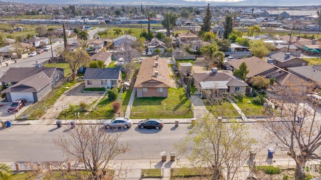 bird's eye view with a residential view and a mountain view