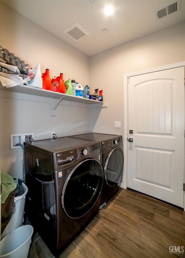 8414 Kowa St, Bakersfield, CA 93314 - washroom with washer and clothes dryer and wood finished floors