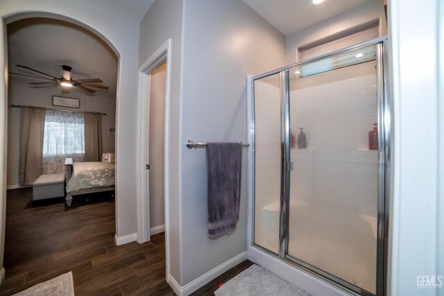 8414 Kowa St, Bakersfield, CA 93314 - bathroom with connected bathroom, a shower stall, wood finished floors, a ceiling fan, and recessed lighting