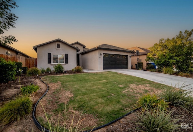 8414 Kowa St, Bakersfield, CA 93314 - ranch-style home with stucco siding, driveway, and a garage