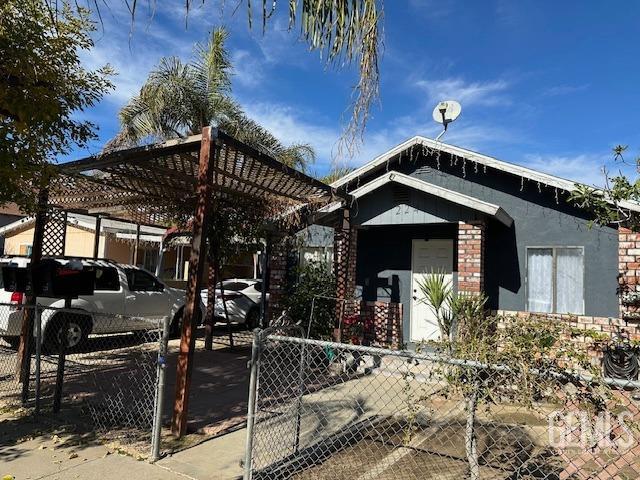 view of front of property with a carport