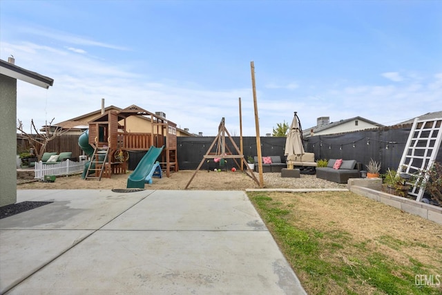 view of jungle gym with outdoor lounge area and a patio