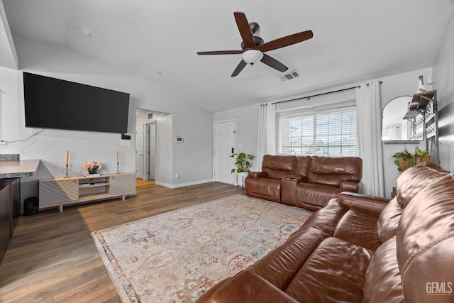 living room with lofted ceiling, dark hardwood / wood-style floors, and ceiling fan