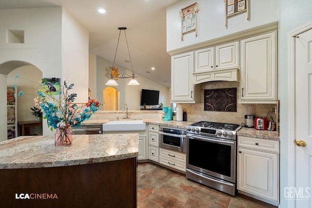 7314 Glenn Miller Ct, Bakersfield, CA 93312 - kitchen with stainless steel appliances, a sink, pendant lighting, backsplash, and light stone countertops