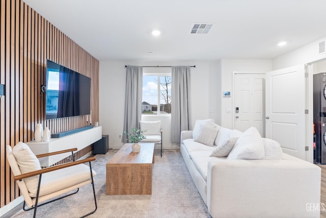 living room with visible vents and recessed lighting