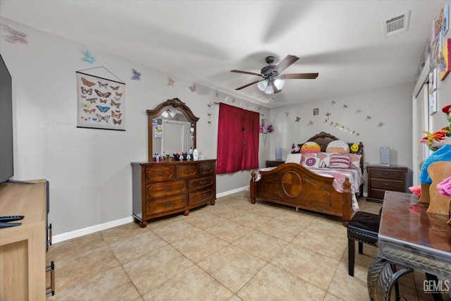 bedroom with visible vents, baseboards, ceiling fan, and light tile patterned flooring