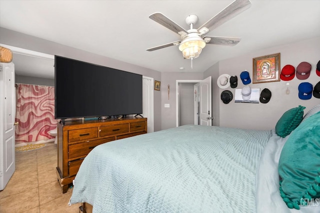 bedroom featuring light tile patterned floors and a ceiling fan