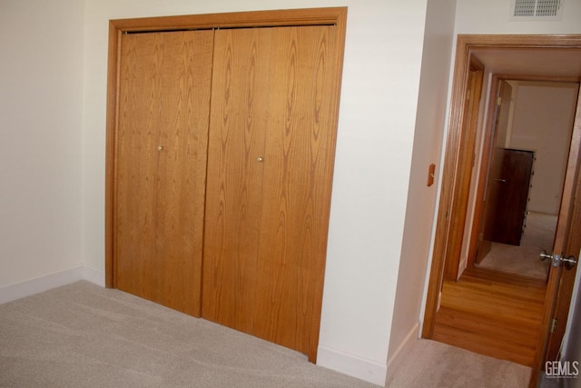 1301 Charterten Ave, Bakersfield, CA 93307 - hallway featuring carpet and baseboards