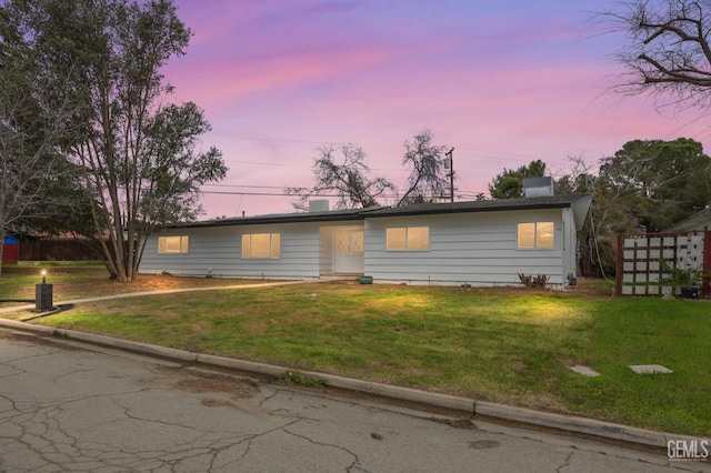 3017 Saratoga St, Bakersfield, CA 93306 - view of front of house with a yard