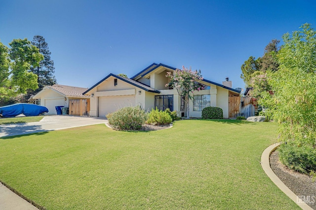 9604 Lea Oak Rd, Bakersfield, CA 93311 - mid-century modern home featuring a garage, stucco siding, a chimney, and driveway